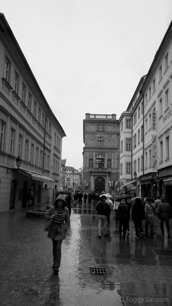 Pedestrians in bohemian rain
